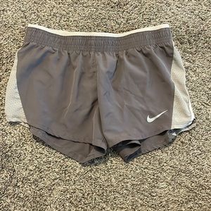 Nike Dark Gray Running Shorts with light Gray mesh sides and split
